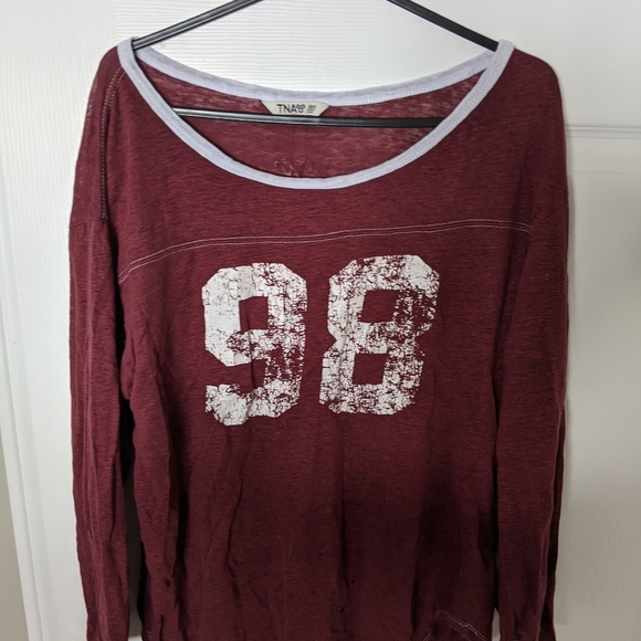 TNA - Picture 1 of 2